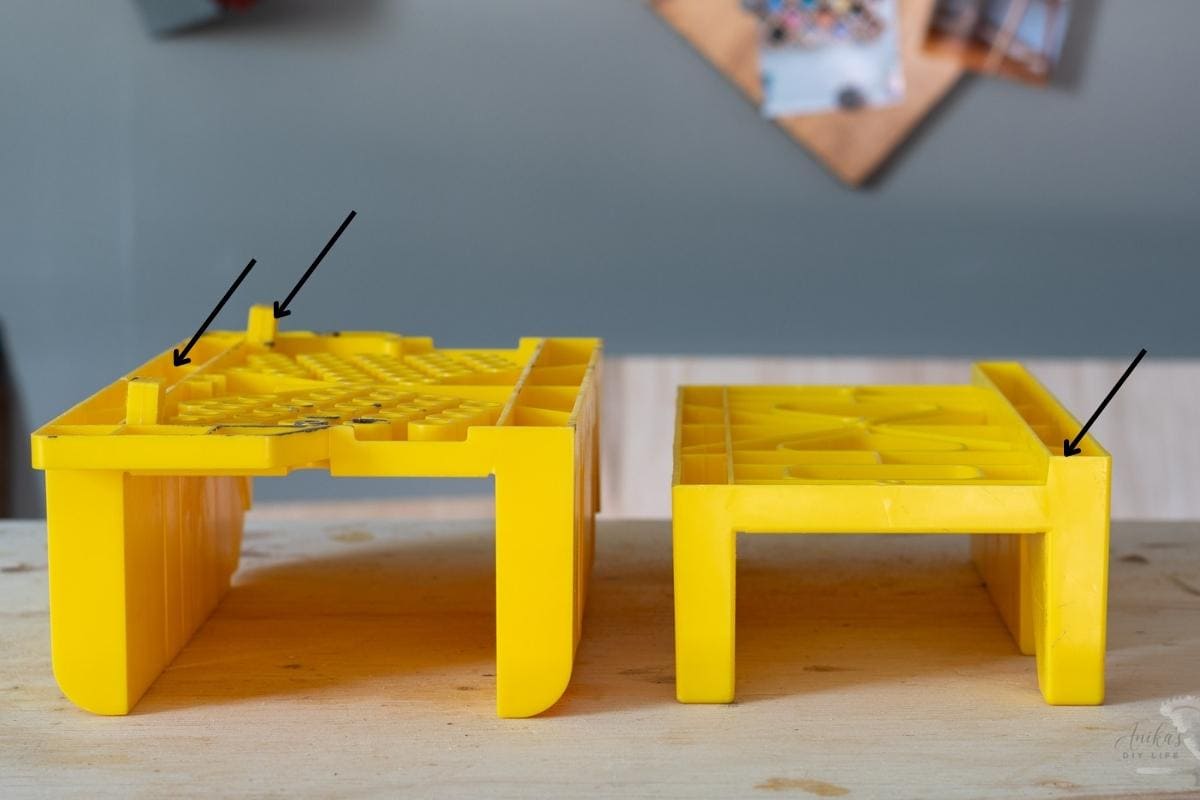 tabs and lip on bottom of miter box to help align to workbench