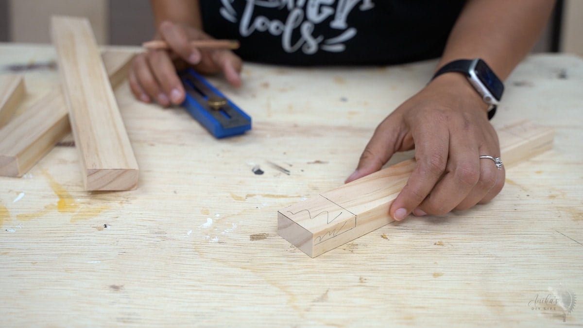 Measuring and marking for the half lap cut.