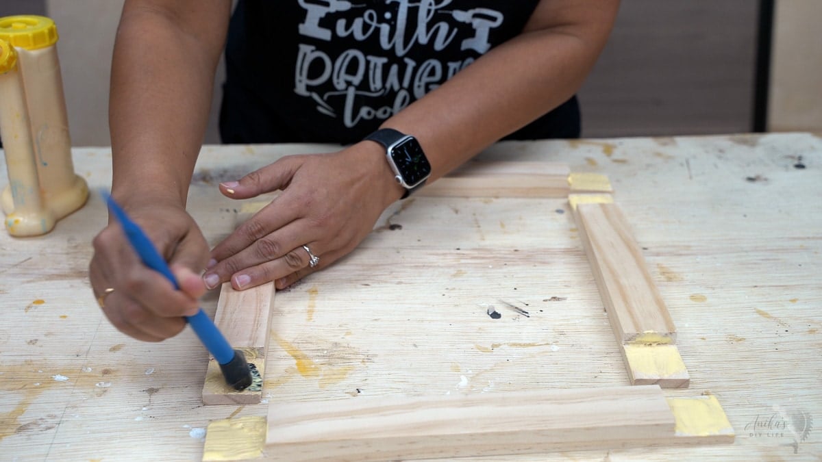 woman applying glue on half lap cuts
