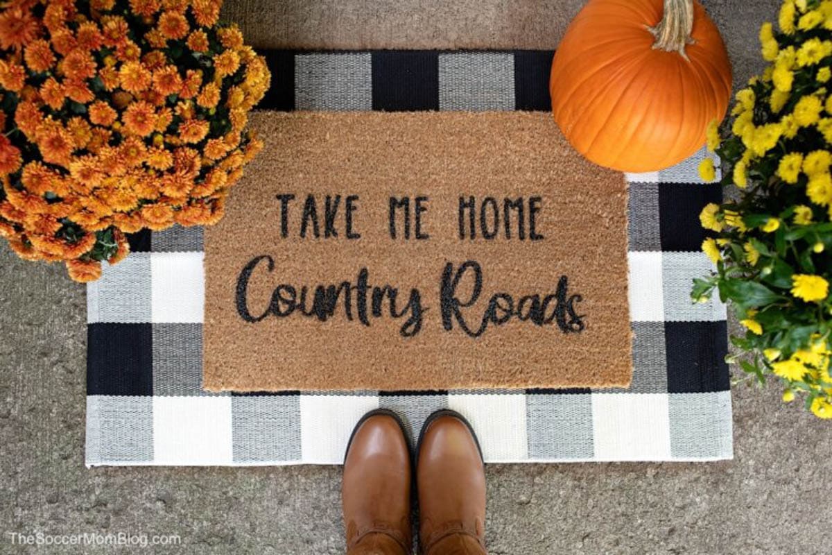 Door mat with custom saying made with Cricut