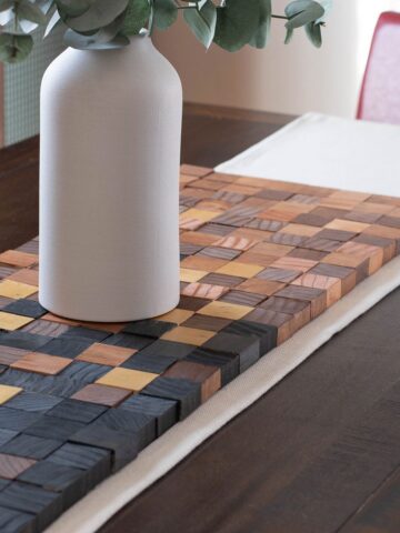 Learn how to build a custom DIY table runner using scrap wood with the detailed step by step instructions.