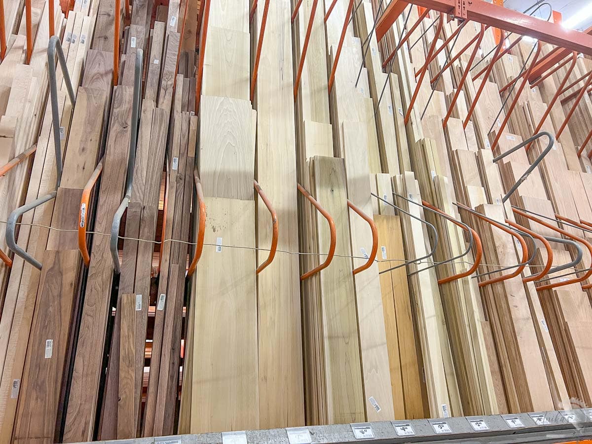 hardwood boards in a home improvement store lumber aisle