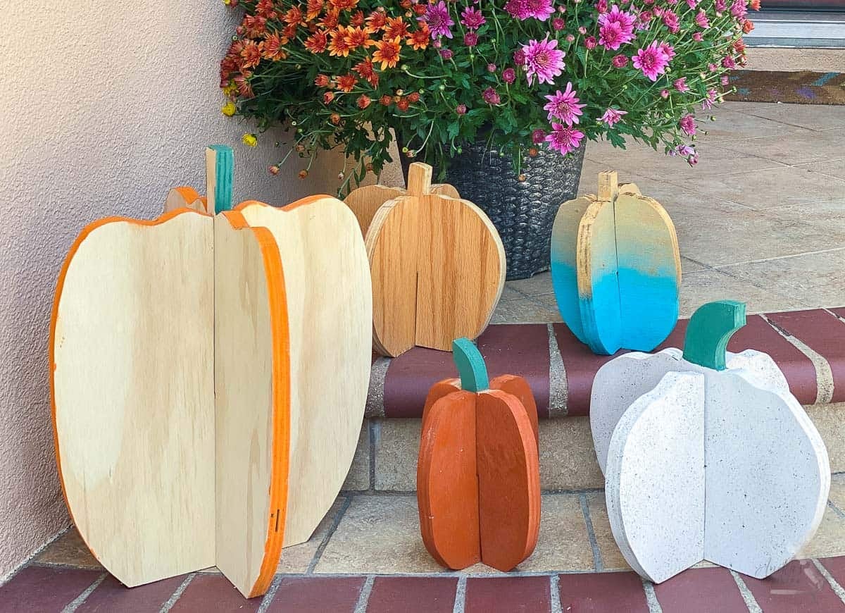 Plywood pumpkins painted different colors