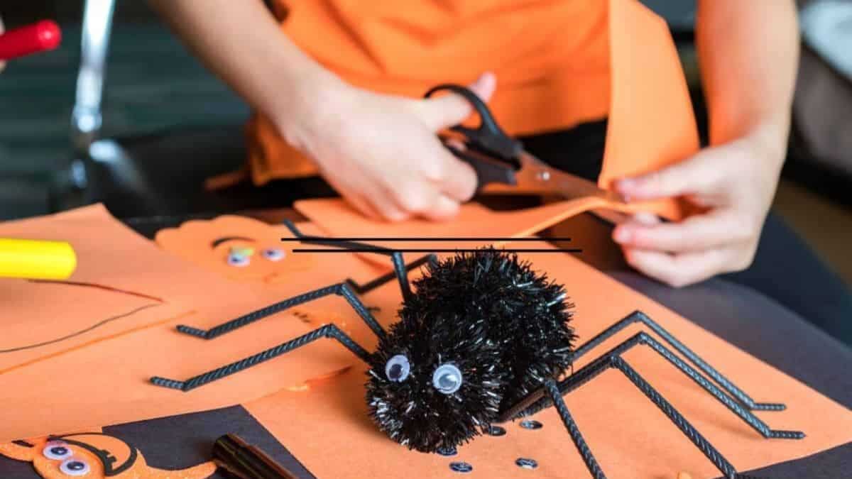 woman making halloween decorations