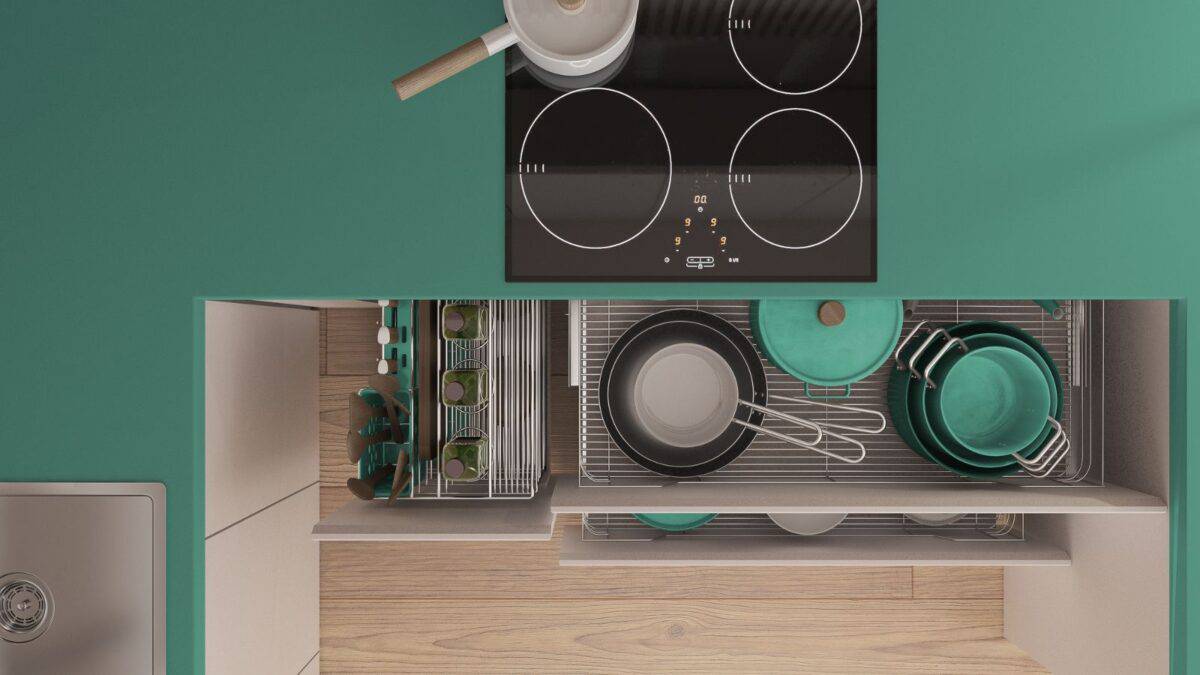 pots and pans in cabinet drawers