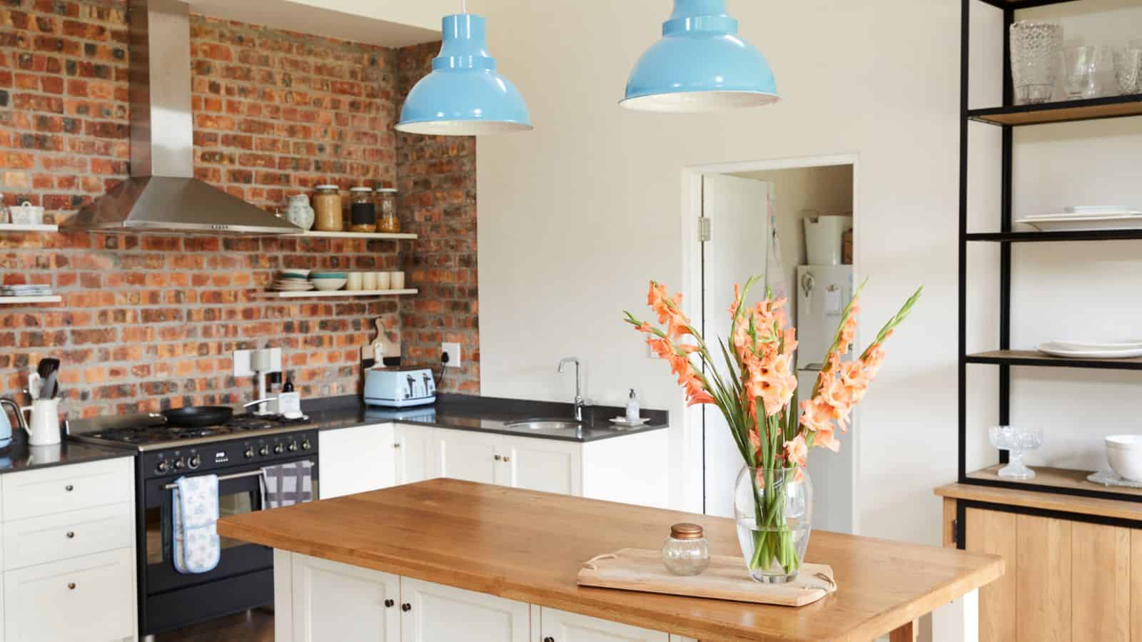 exposed brick wall in the kitchen