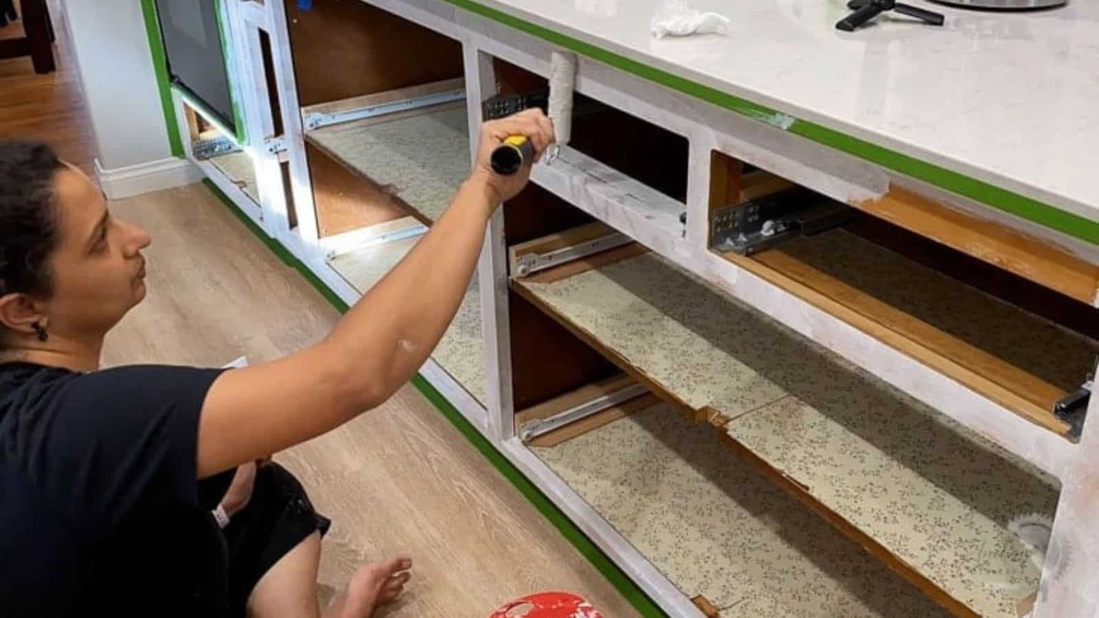 Anika painting cabinets