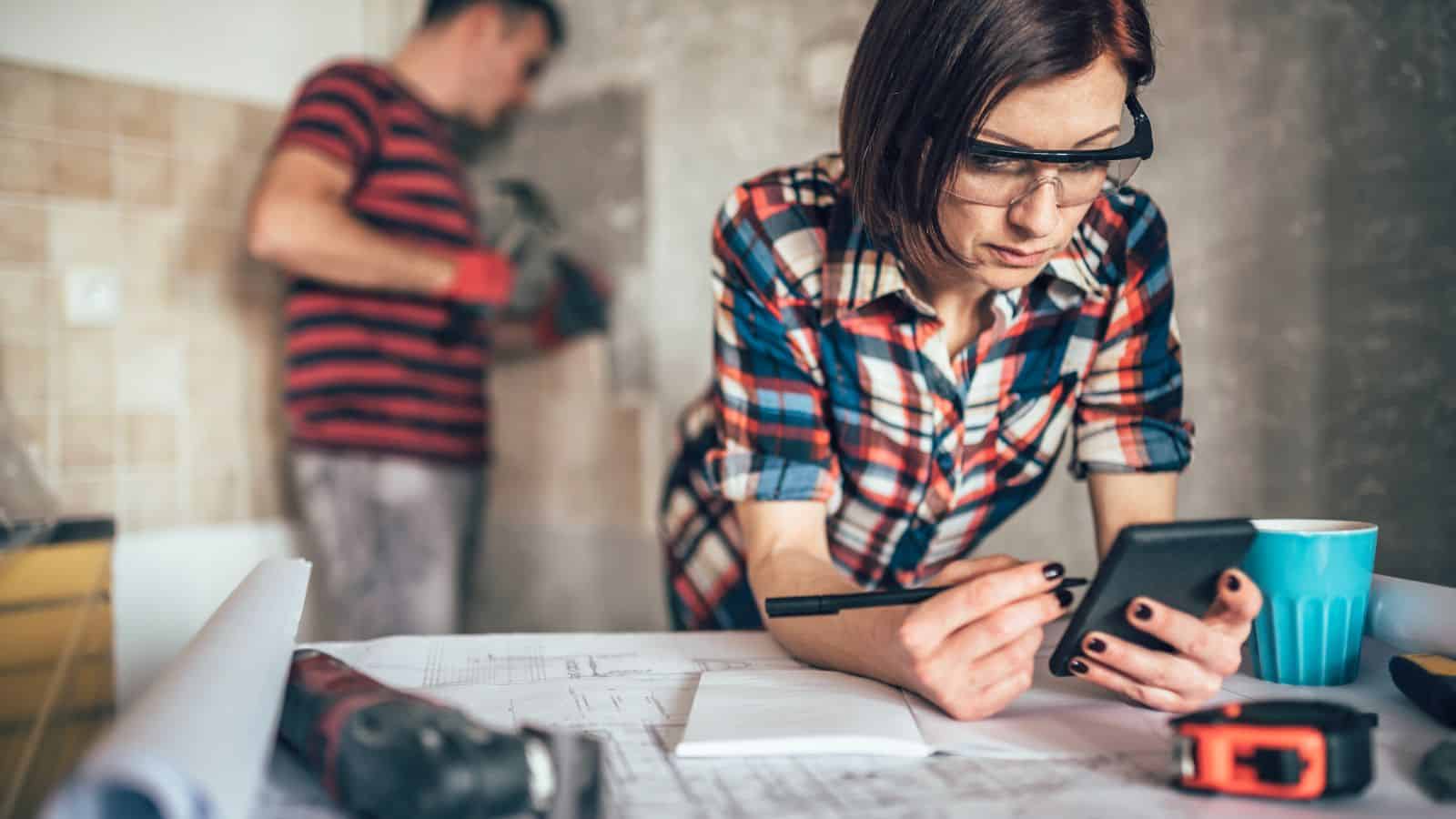 man and woman working on a renovation