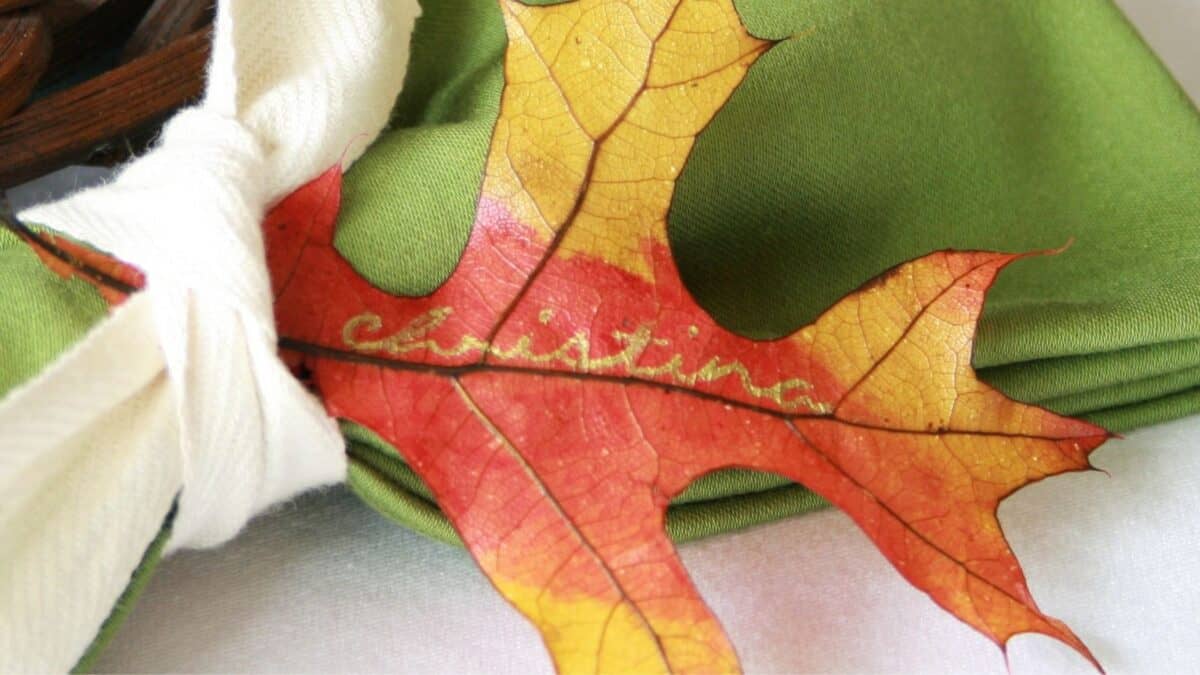 Leaf with name written on it as name card for Thanksgiving table