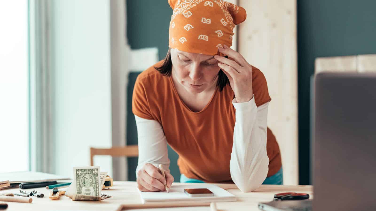 Woman budgeting for a DIY project