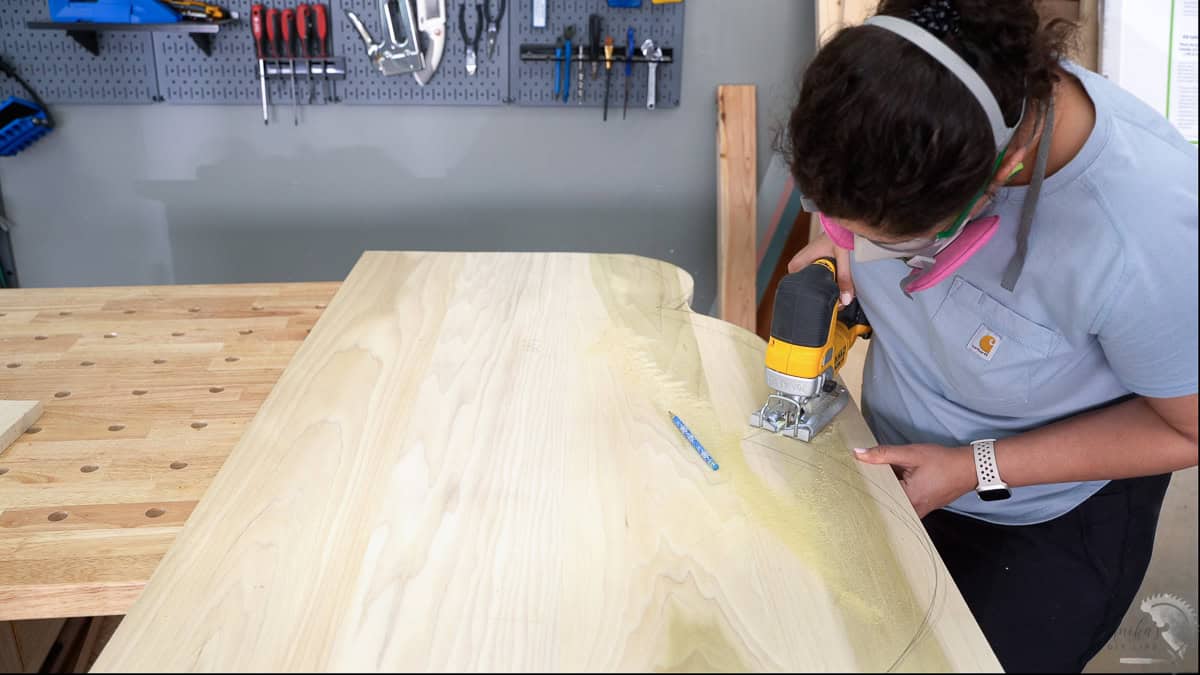 cutting out the headboard shape using a jigsaw