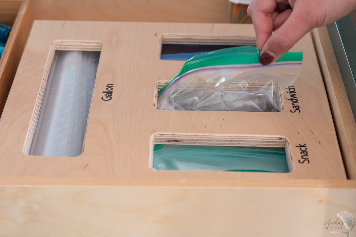 DIY Ziploc bag organizer in a kitchen drawer.