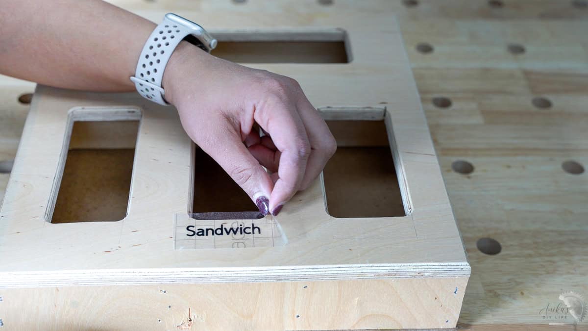 Adding decals to label the holes in the diy ziploc bag organizer