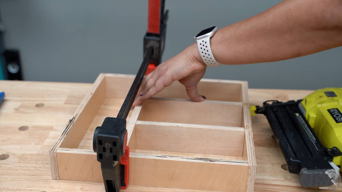 Attaching the dividers in the DIY ziploc bag organizer