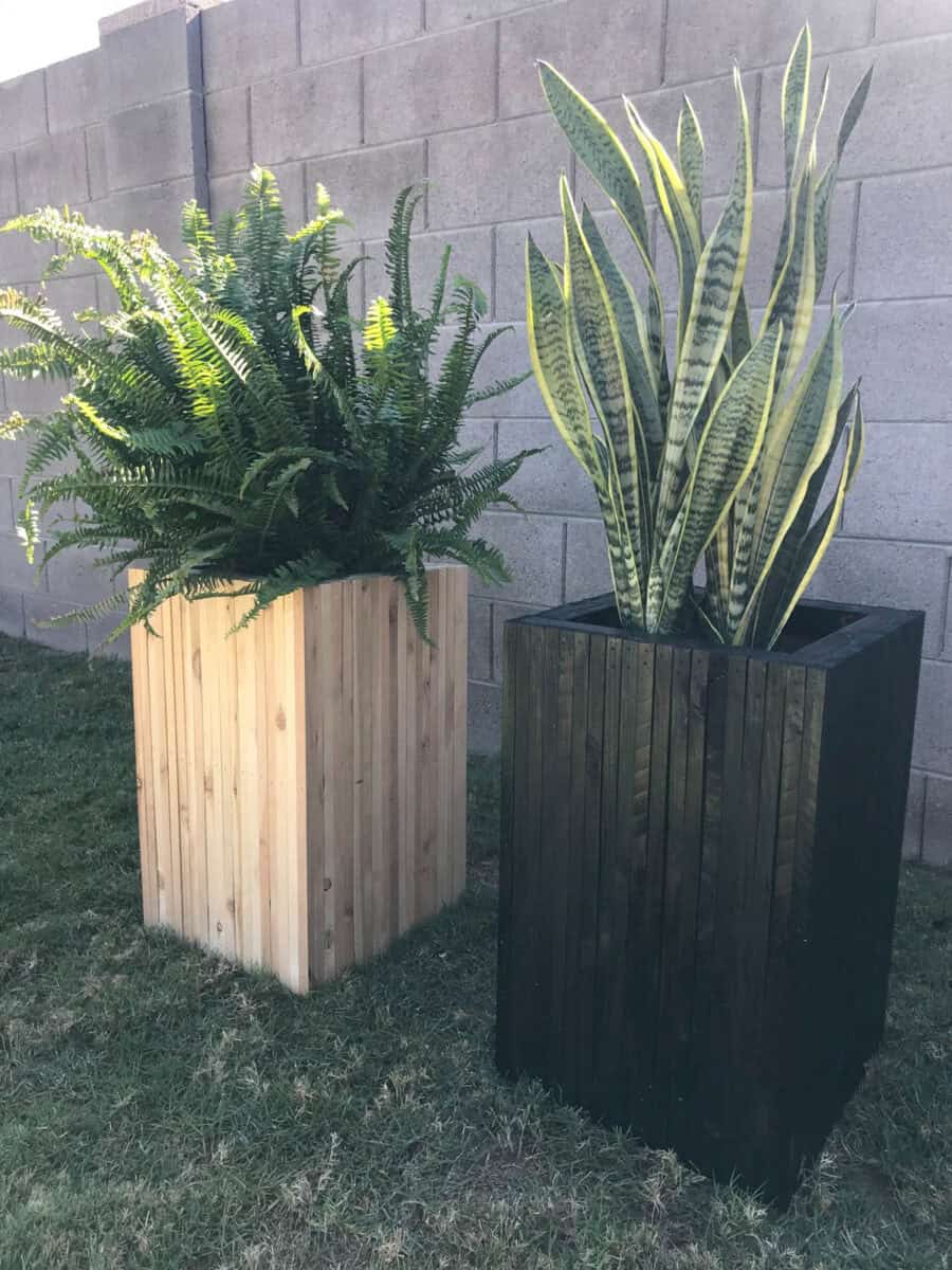 2 modern planter boxes one painted on stained