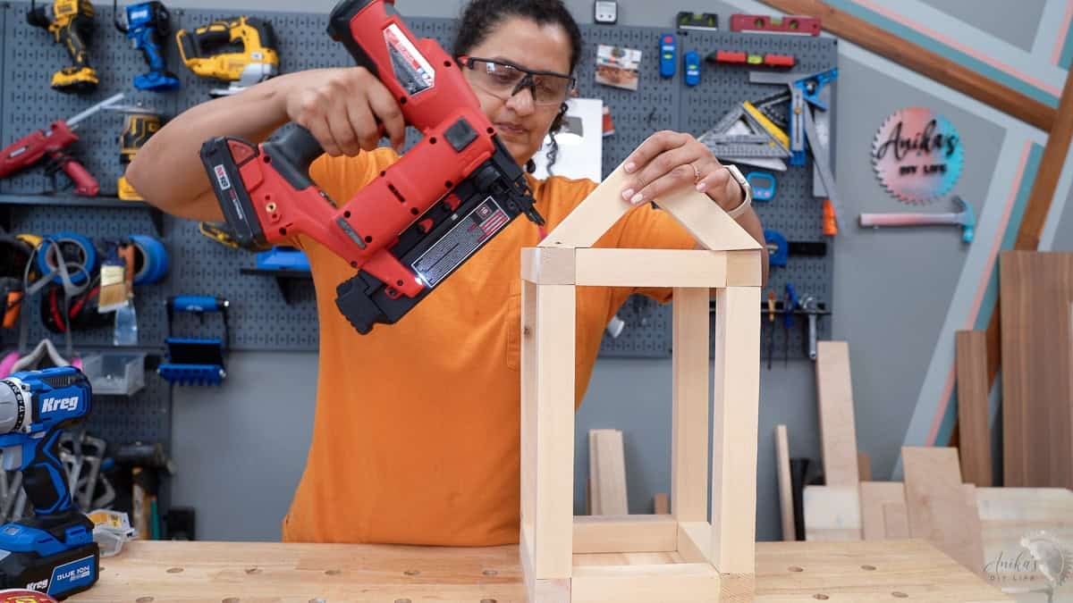 Attaching the top pieces to make the house shape.