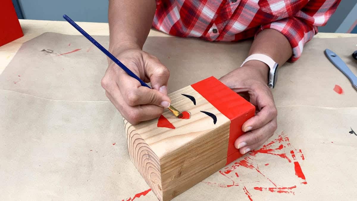 painting the top block as Santa's face