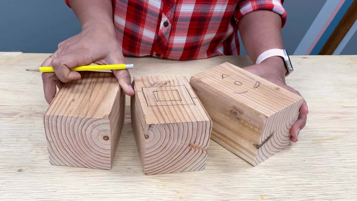 4X4 blocks with belt and Santa face drawn in pencil