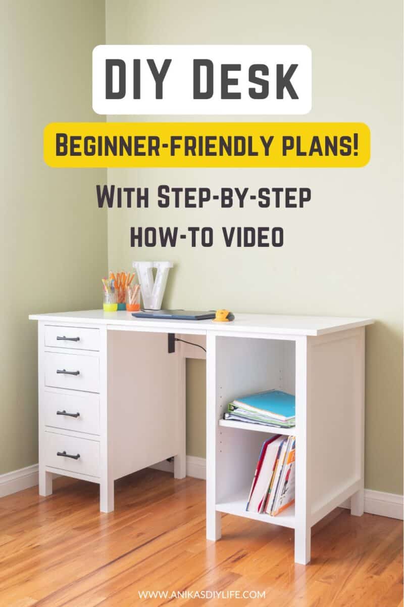 A white handmade wooden desk with four black drawer pulls and two open shelves on a wood floor with text overlay