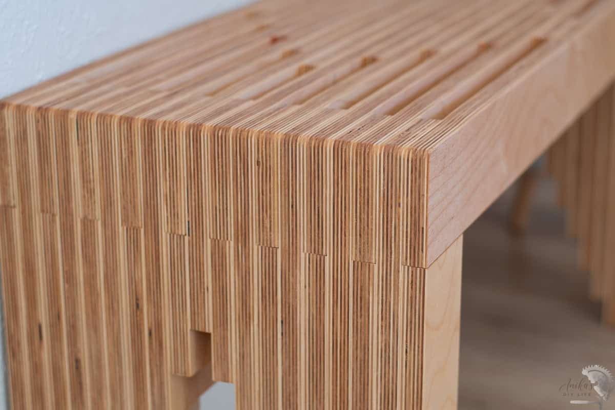 close up of the edge of the diy plywood bench showing all the layers.