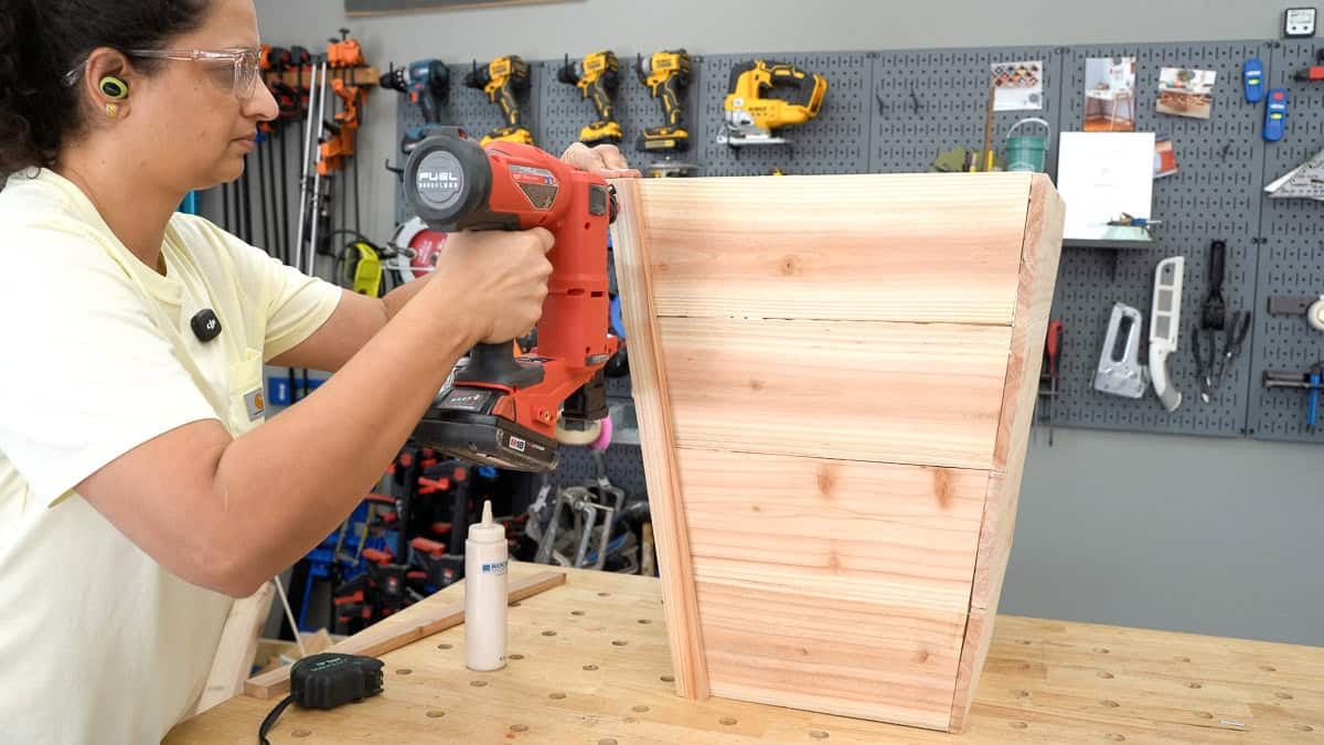 Attaching the vertical trim pieces to the sides