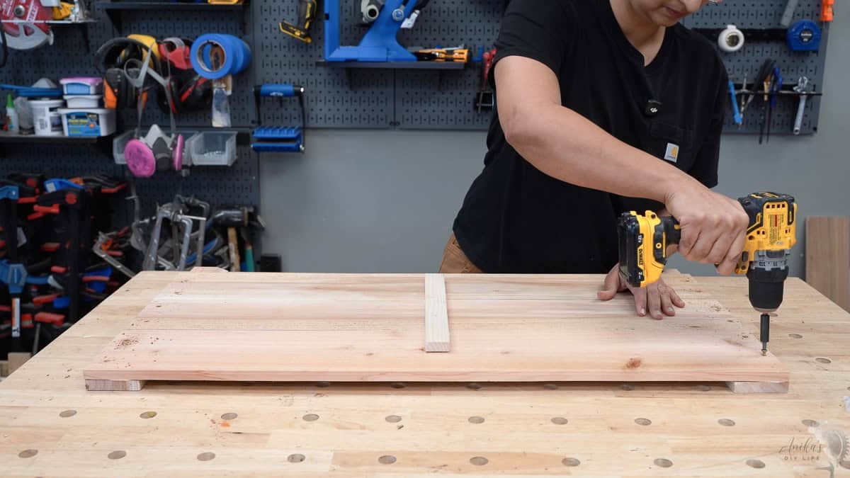 Adding extra screws to the boards for a better hold.