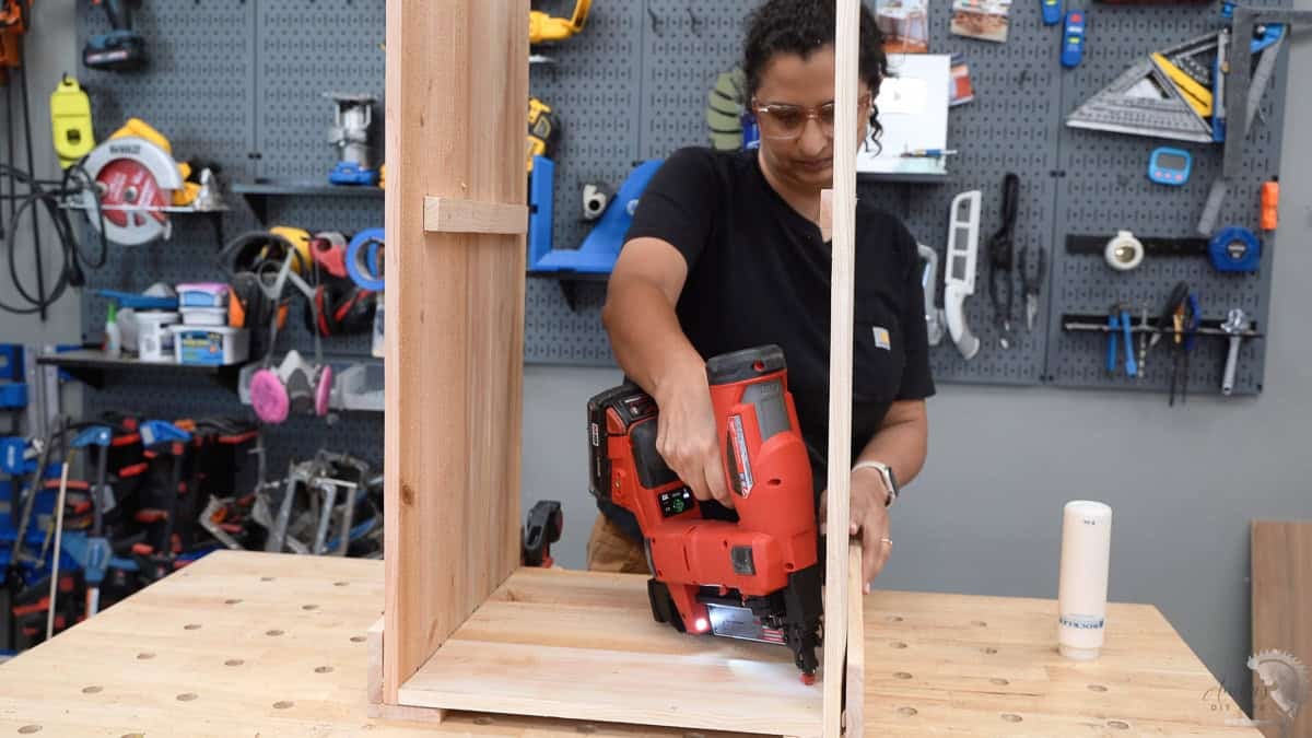 Attaching the small boards to build a box for the planter
