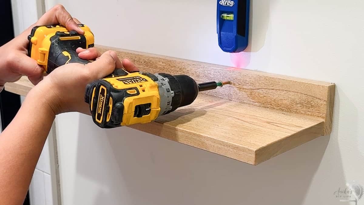 Attaching the easy diy floating shelf to the wall